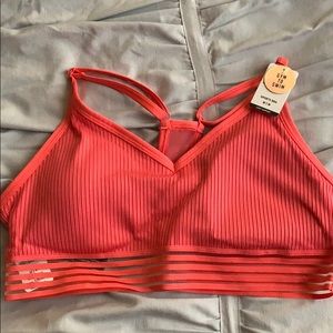 Pink Victoria’s Secret sports bra